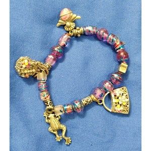 Bracelet purple beads purses frog perfume bottle charms stretch 3 - 4  long